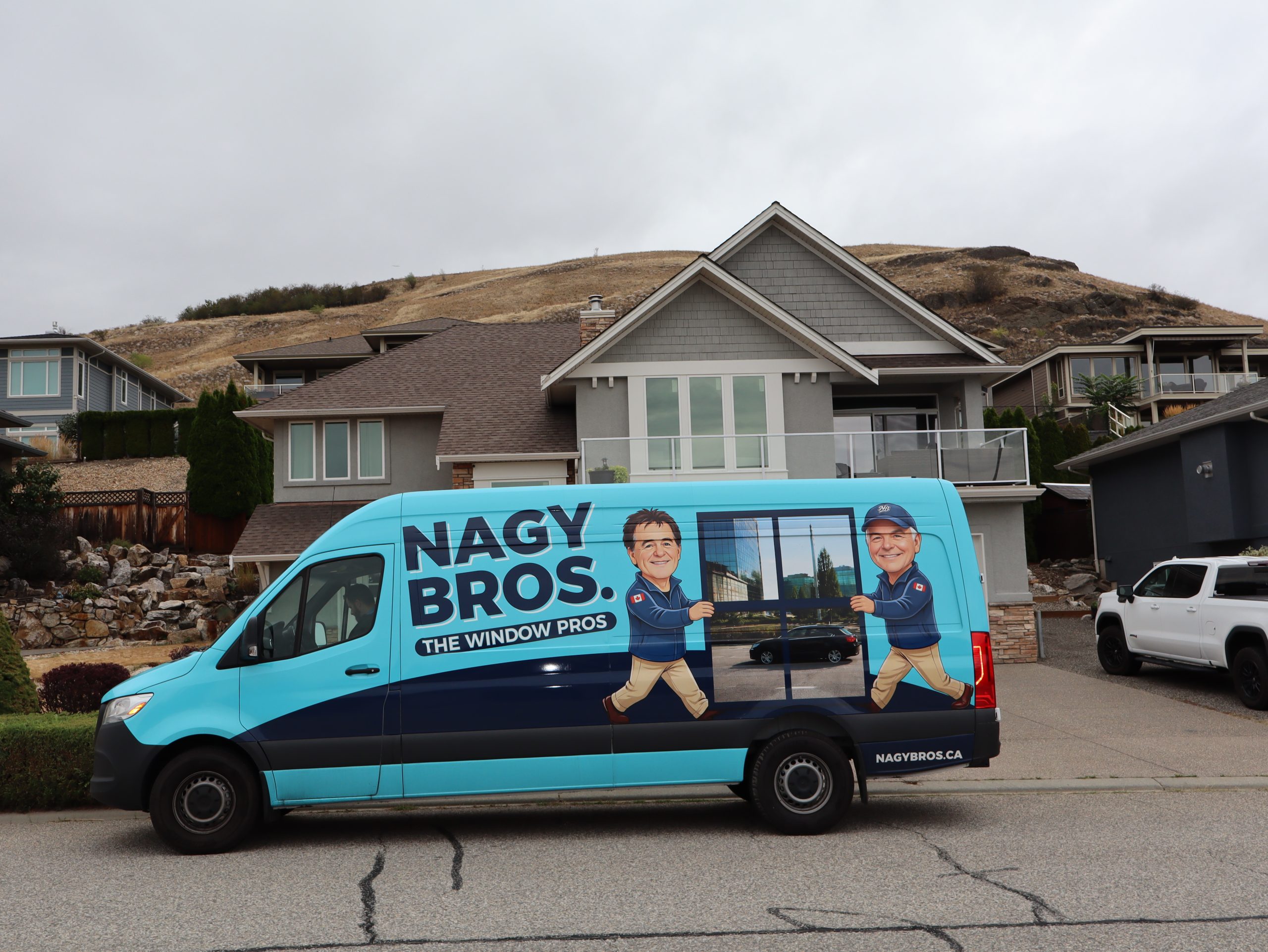Nagy Bros Van in front of a home they installed windows on
